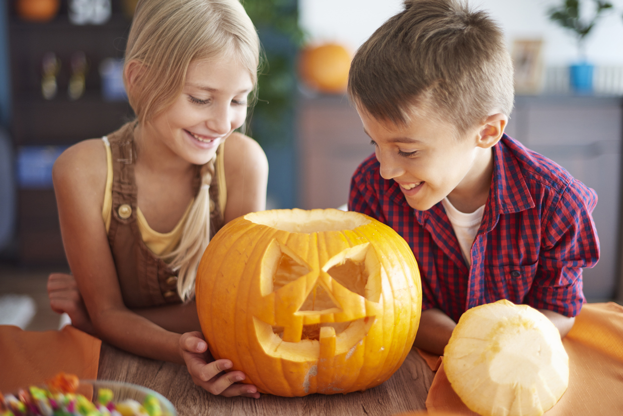 Children carving pumpkins